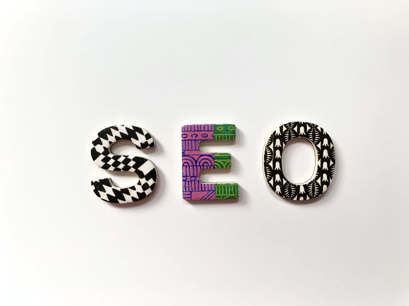 Decorative SEO letters illustrating search engine optimization concepts
